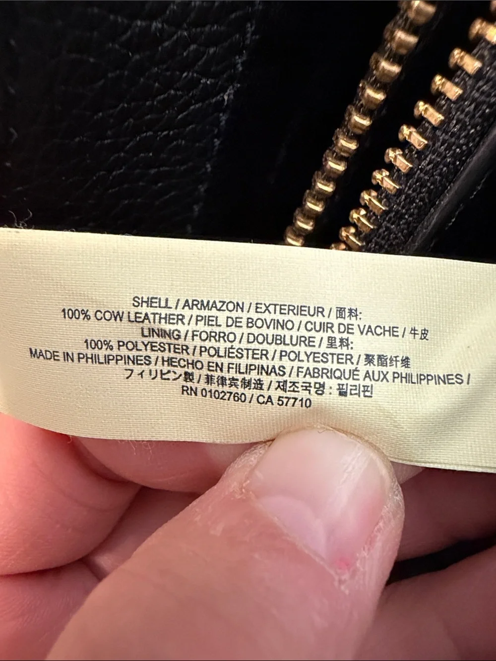 Kate Spade Black Pebbled Leather- handbag w/ three separate compartments,